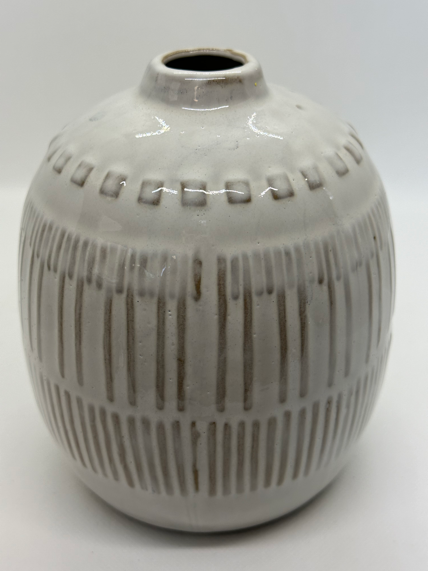 White Glazed ceramic vase with primitive geometric dimensional motif